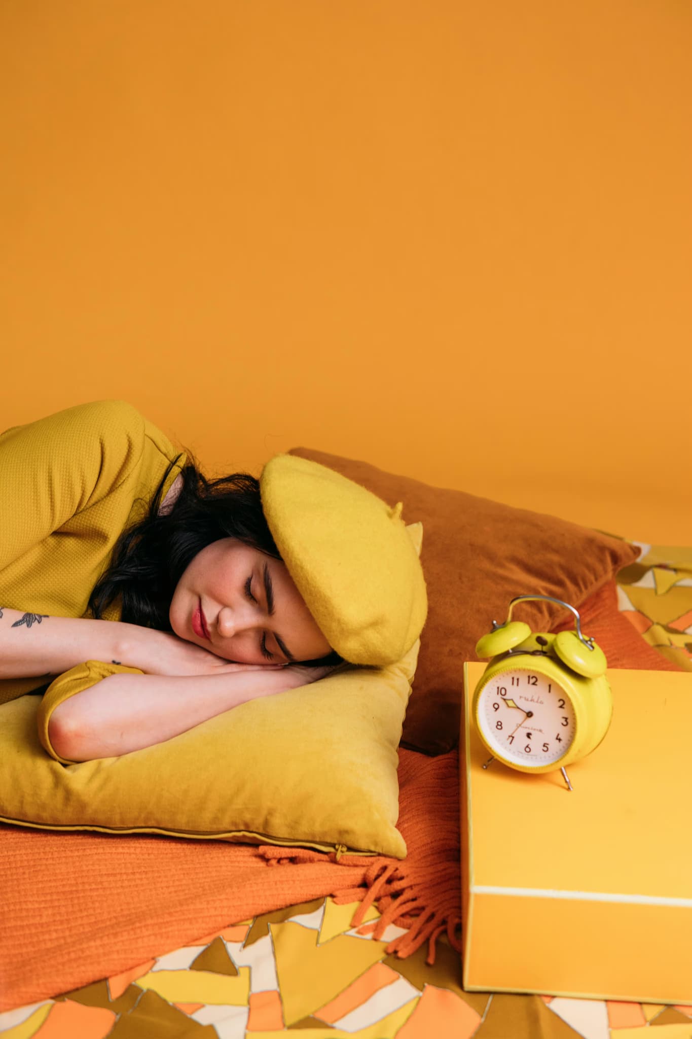 Person with yellow pillow